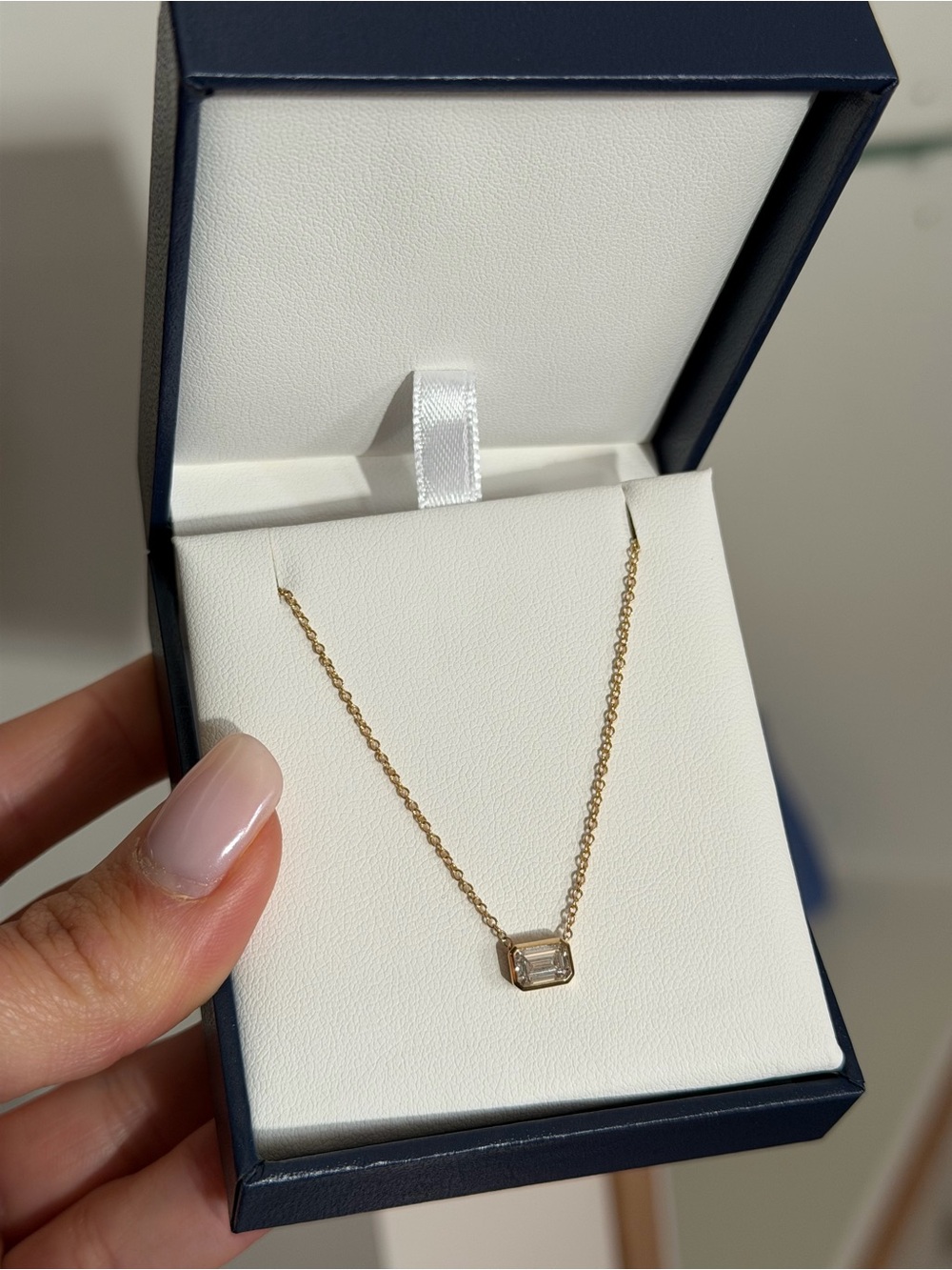 Lab grown emerald bezel diamond necklace